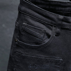 Lente en zomer nieuwe jeans Puur zwarte gescheurde stretchjeans heren Zwarte jeans heren
