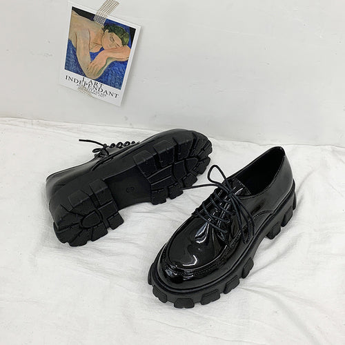 Female black leather shoes