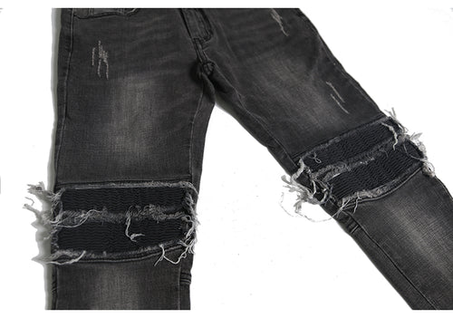 Op maat gemaakte jeans met gatenpatch