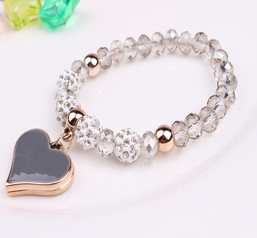 Elastische kristallen armband en armband met hartvormige armbanden